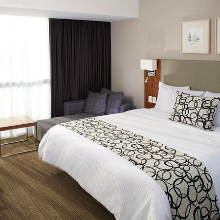 Casa Inn Premium Hotel Queretaro Miranda Exterior photo A bed runner
