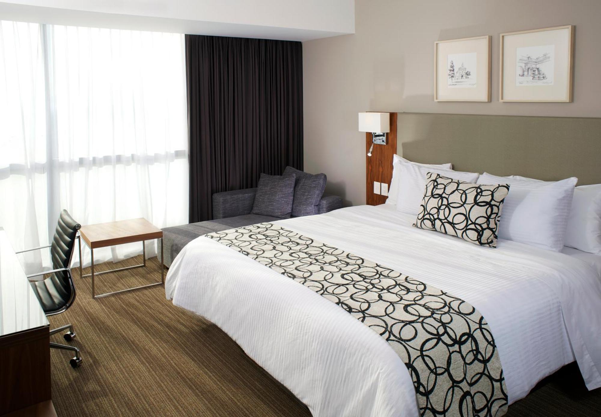 Casa Inn Premium Hotel Queretaro Miranda Exterior photo A bed runner